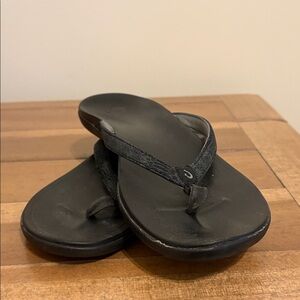 Olukai Black Flip Flops